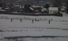 Football on snow - view from train window(From Day 2